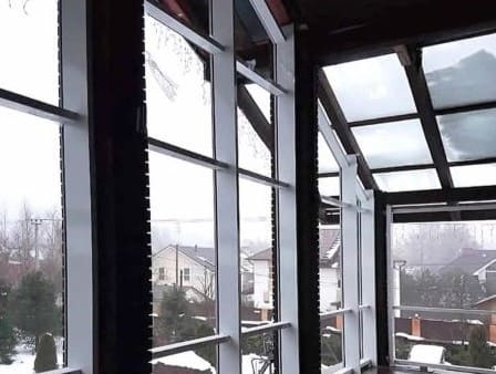 Остекление балкона частного дома панорамными окнами